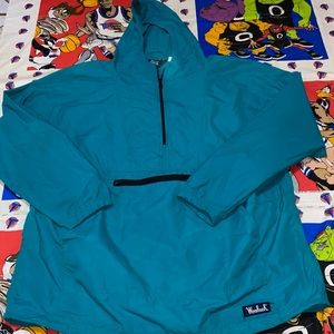 Teal color have zip windbreaker